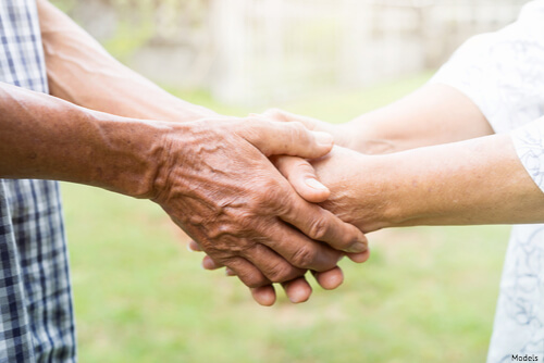 Two people shaking hands