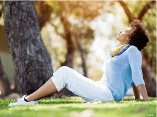 Woman laying in grass