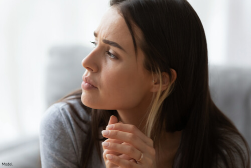 woman looking concerned