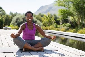 Woman meditating outside