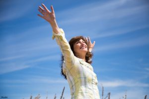 Woman with her hands in the air