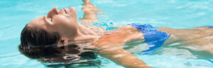 Woman relaxing in pool