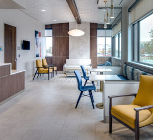 modern contemporary sitting room with yellow chairs