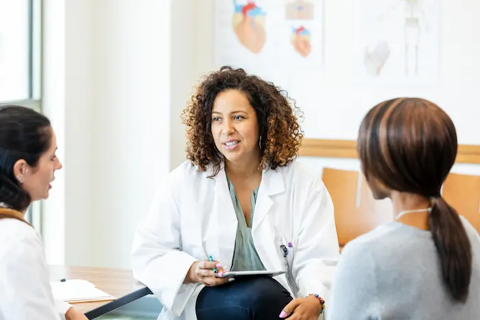doctor and patients standing